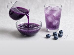 Illustrative image: frozen blueberry pulp, pourable, diluted as a drink