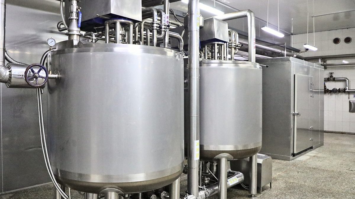 Stainless steel processing tanks in the workshop